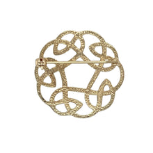 Load image into Gallery viewer, Bring symbolic design and timeless elegance to your collection with this pre-owned 9ct yellow gold Celtic knot brooch—a refined piece inspired by heritage and tradition.

Design: This brooch features an intricate Celtic knot motif, representing eternity and interconnectedness through its flowing, continuous lines.
Material: Made from 9-carat yellow gold, the polished finish enhances the detailed craftsmanship and gives the piece a warm, classic glow.

