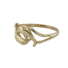 Load image into Gallery viewer, Bring playful charm and ocean-inspired elegance to your collection with this pre-owned 9ct yellow gold dolphin ring—a lighthearted design with timeless appeal.

Design: This ring features a detailed dolphin motif across the 8mm high front, capturing the graceful movement and spirit of the sea.
Material: Made from 9-carat yellow gold, the polished finish enhances the smooth curves and warm tone of the design.

