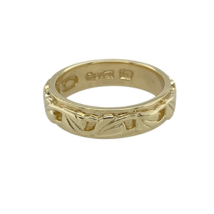 Celebrate love, connection, and heritage with this pre-owned 9ct yellow gold Clogau Cariad Tree of Life band ring—a meaningful design enriched with Welsh tradition and timeless elegance.

Design: The 5mm wide band features the iconic Tree of Life motif, symbolising growth and unity, with the word Cariad—Welsh for "beloved"—engraved as a heartfelt accent.
Material: Made from 9-carat yellow gold with rare Welsh gold, the polished finish enhances the flowing design and warm tone.
