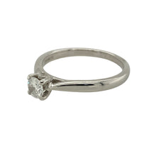 Load image into Gallery viewer, Celebrate simplicity and sparkle with this pre-owned 9ct white gold diamond set solitaire ring—a timeless classic with elegant brilliance and refined charm.

Design: The ring features a single 0.25ct brilliant-cut diamond in a classic solitaire setting, offering timeless elegance and a clean, sparkling focal point.
Material: Made from 9-carat white gold, the polished finish enhances the crisp brilliance of the diamond and provides a sleek, modern backdrop.

