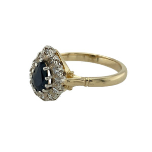 Add striking elegance and deep blue allure to your collection with this pre-owned 9ct yellow gold sapphire and cubic zirconia teardrop cluster ring—an eye-catching piece perfect for special occasions or adding a statement to everyday style.

Design: This ring features a 7mm by 5mm teardrop-shaped sapphire at the centre, framed by a sparkling cluster of cubic zirconia that enhances the rich blue focal stone with brilliant contrast.
