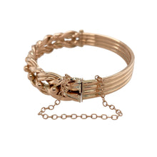 Load image into Gallery viewer,  Add vintage elegance and distinctive detail to your collection with this pre-owned 9ct rose gold plaited and ball hinged bangle—a statement piece that combines intricate design with timeless charm, perfect for special occasions or standout everyday style.

Design: This hinged bangle features an eye-catching plaited pattern accented by polished ball details across the 10mm wide front, creating a rich and textured look.
