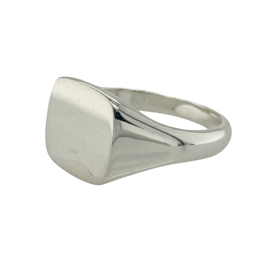 Bring modern simplicity and timeless style to your collection with this new 925 silver plain square signet ring, offering a sleek design and confident presence—perfect for those who appreciate clean, understated elegance.

Design: The ring features a polished square front measuring 12mm high, creating a bold yet minimalist look. The smooth surface offers a contemporary feel and can be worn alone or engraved for a personal touch.
