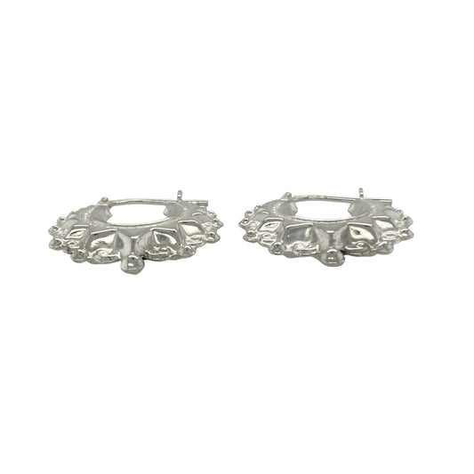 Bring timeless elegance and versatile shine to your collection with these new 925 silver fancy round creole earrings, offering a classic design and effortless style—perfect for elevating any look from day to night.

Design: The earrings feature a sophisticated round creole style with a fancy, detailed finish, measuring approximately 20mm in diameter. Their clean yet eye-catching design makes them a staple for any jewellery wardrobe.
