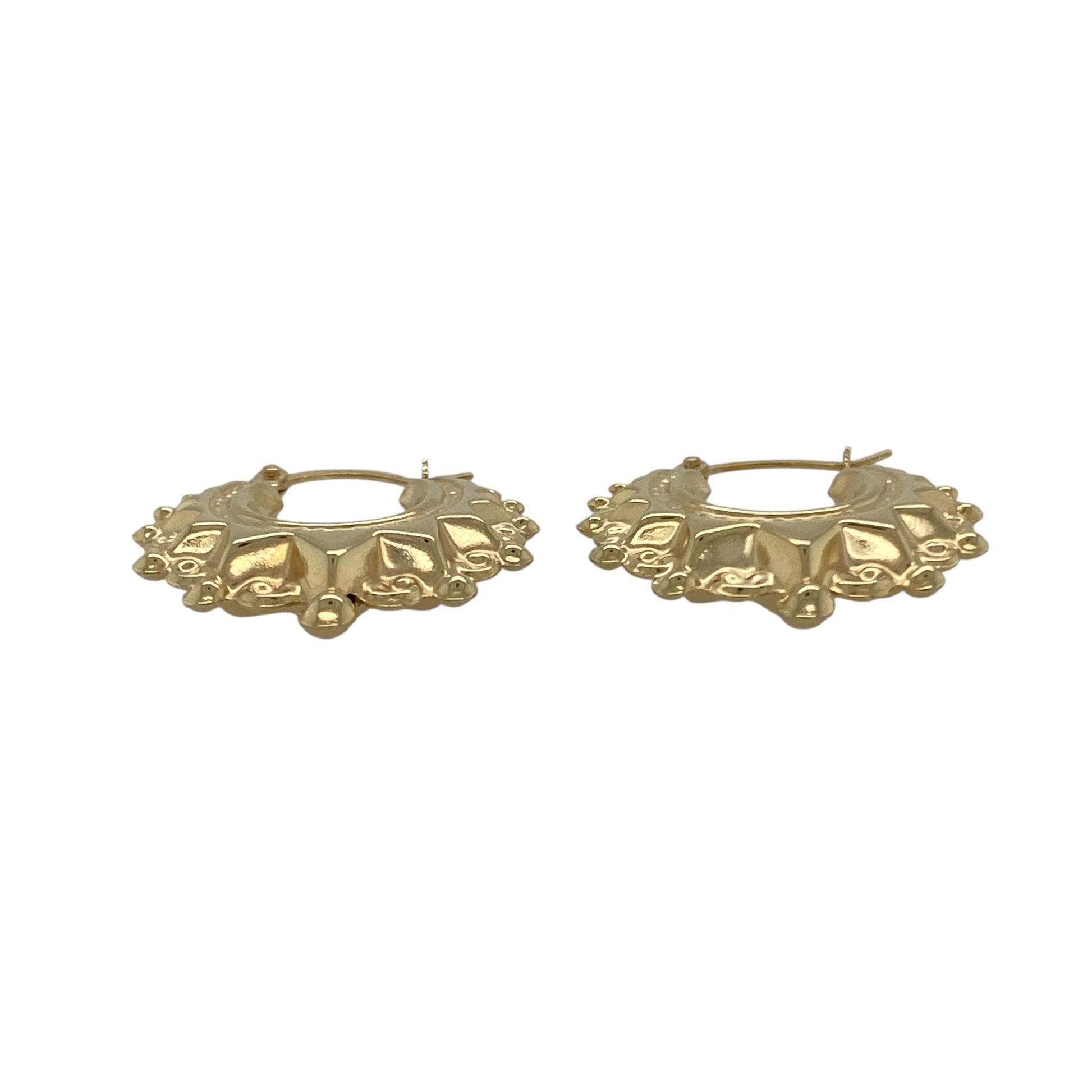 Bring warm elegance and timeless shine to your collection with these new 9ct yellow gold fancy round creole earrings, offering a classic design and refined detail—perfect for elevating any look.

Design: The earrings feature a sophisticated round creole style with a fancy, detailed finish, measuring approximately 20mm in diameter. Their graceful curves and intricate design create a versatile and eye-catching silhouette.
