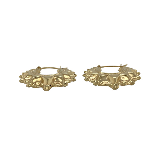 Bring warm elegance and timeless shine to your collection with these new 9ct yellow gold fancy round creole earrings, offering a classic design and refined detail—perfect for elevating any look.

Design: The earrings feature a sophisticated round creole style with a fancy, detailed finish, measuring approximately 20mm in diameter. Their graceful curves and intricate design create a versatile and eye-catching silhouette.
