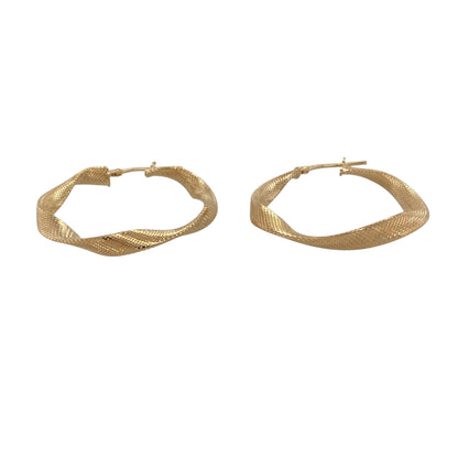 Bring modern elegance and eye-catching texture to your collection with these new 9ct yellow gold twisted textured hoop creole earrings, offering a refined design and radiant shine—perfect for adding a sophisticated statement to any look.

Design: The earrings feature a twisted hoop creole style with a textured finish, measuring approximately 32mm in diameter. The combination of the twisting form and intricate texture creates a dynamic, contemporary silhouette that catches the light beautifully.
