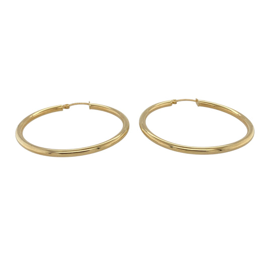 Bring timeless elegance and classic shine to your collection with these new 9ct yellow gold plain hoop creole earrings, offering a sleek design and versatile style—perfect for adding a polished touch to any look.

Design: The earrings feature a simple and smooth hoop creole style, measuring approximately 40mm in diameter. The clean, minimalist design creates a timeless silhouette that pairs effortlessly with any outfit.
