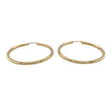 Load image into Gallery viewer, Bring timeless elegance and classic shine to your collection with these new 9ct yellow gold plain hoop creole earrings, offering a sleek design and versatile style—perfect for adding a polished touch to any look.

Design: The earrings feature a simple and smooth hoop creole style, measuring approximately 40mm in diameter. The clean, minimalist design creates a timeless silhouette that pairs effortlessly with any outfit.


