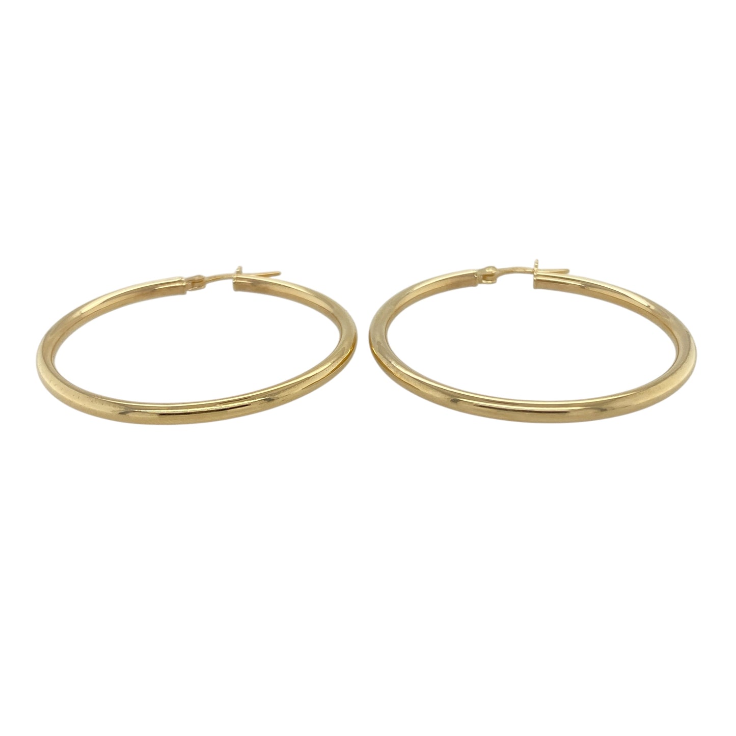 Bring timeless elegance and effortless shine to your collection with these new 9ct yellow gold plain hoop creole earrings, offering a sleek design and versatile style—perfect for adding a classic touch to any look.

Design: The earrings feature a smooth and minimalist hoop creole style, measuring approximately 39mm in diameter. The clean lines and simple silhouette make them a timeless and easy-to-wear choice for any occasion.
