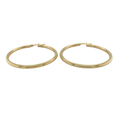 Bring timeless elegance and effortless shine to your collection with these new 9ct yellow gold plain hoop creole earrings, offering a sleek design and versatile style—perfect for adding a classic touch to any look.

Design: The earrings feature a smooth and minimalist hoop creole style, measuring approximately 39mm in diameter. The clean lines and simple silhouette make them a timeless and easy-to-wear choice for any occasion.
