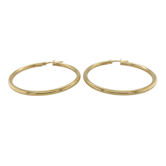 Bring timeless elegance and effortless shine to your collection with these new 9ct yellow gold plain hoop creole earrings, offering a sleek design and versatile style—perfect for adding a classic touch to any look.

Design: The earrings feature a smooth and minimalist hoop creole style, measuring approximately 39mm in diameter. The clean lines and simple silhouette make them a timeless and easy-to-wear choice for any occasion.
