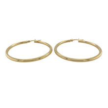 Load image into Gallery viewer, Bring timeless elegance and effortless shine to your collection with these new 9ct yellow gold plain hoop creole earrings, offering a sleek design and versatile style—perfect for adding a classic touch to any look.

Design: The earrings feature a smooth and minimalist hoop creole style, measuring approximately 39mm in diameter. The clean lines and simple silhouette make them a timeless and easy-to-wear choice for any occasion.

