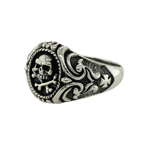 Bring bold attitude and edgy symbolism to your collection with this new 925 silver skull and crossbones signet ring, offering a striking design and fearless presence—perfect for making a powerful statement.

Design: The ring features a dramatic skull and crossbones motif on the front, measuring 18mm high, with patterned shoulders that add extra detail and character. The combination of these elements creates a strong, rebellious look that stands out boldly.
