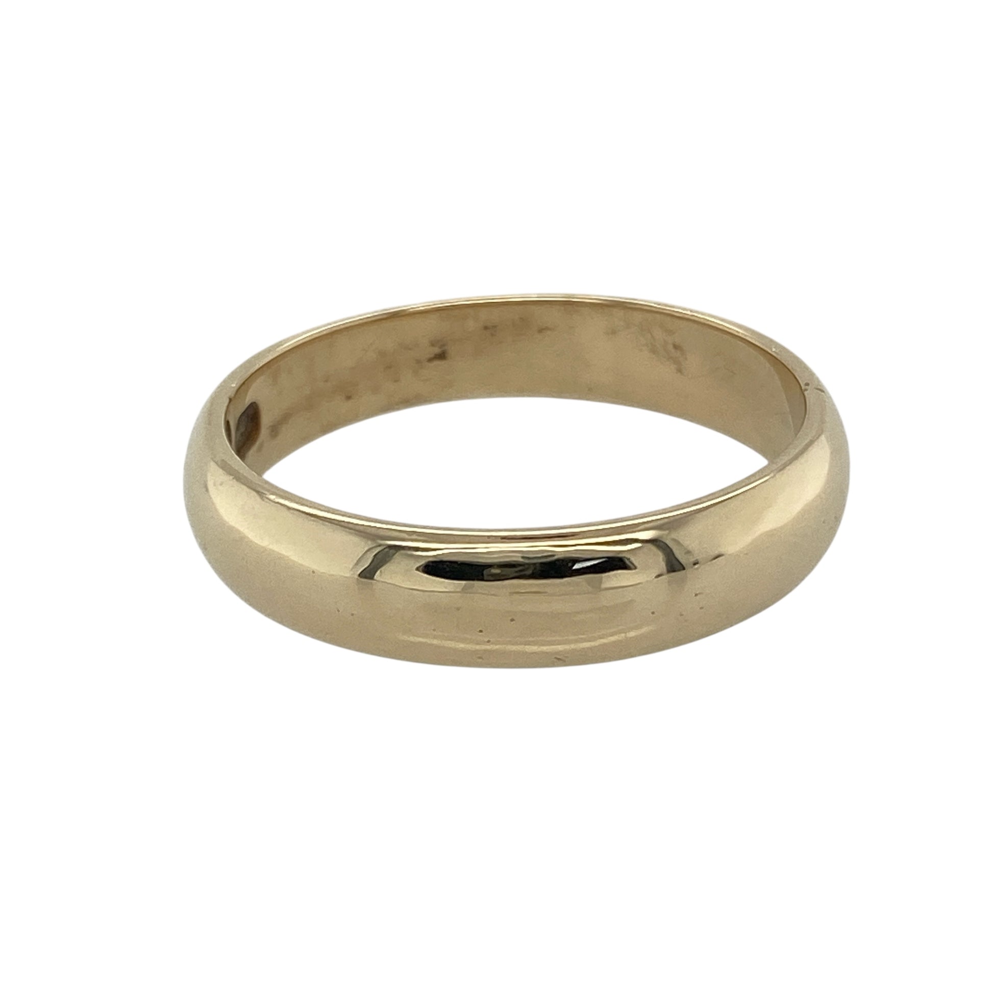 Bring timeless elegance and heartfelt sentiment to your collection with this pre-owned 9ct yellow gold Clogau Cariad 5mm wedding band ring, offering a classic design and meaningful presence—perfect for celebrating love and commitment.

Design: The ring features a smooth 5mm wide band with the iconic "Cariad" inscription, meaning "beloved" in Welsh, symbolising deep affection and eternal connection. Its classic shape and polished finish create a refined and timeless look.
