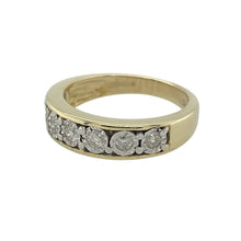 Load image into Gallery viewer, Bring classic sparkle and refined elegance to your collection with this pre-owned 9ct yellow gold and diamond illusion set band ring, offering a timeless design and sophisticated presence—perfect for adding a touch of brilliance to any look.

Design: The ring features a sleek band design with a 5mm wide front, adorned with approximately 0.25ct total of diamonds in an illusion setting. This setting style maximises the visual impact of the diamonds, creating a dazzling and eye-catching effect.
Material: Made 
