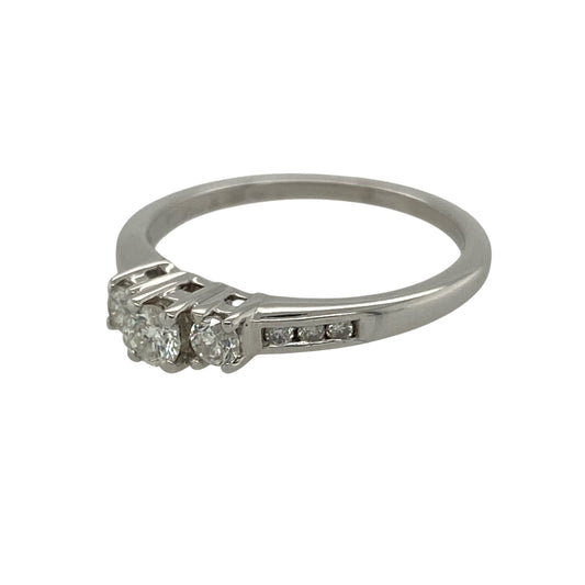 Bring timeless sophistication and radiant sparkle to your collection with this pre-owned platinum and diamond set trilogy ring, offering a refined design and elegant presence—perfect for marking life’s most meaningful moments.

Design: The ring features a classic trilogy design adorned with approximately 0.33ct total of brilliant diamonds, with additional diamonds set in the shoulders for extra shimmer. 