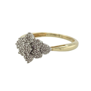 Bring delicate sparkle and timeless romance to your collection with this pre-owned 9ct yellow gold and diamond set flower cluster ring, offering a refined design and elegant presence—perfect for adding a touch of feminine charm to any look.

Design: The ring features a beautiful flower cluster design at the front, measuring 11mm high, set with shimmering diamonds that create a soft, radiant focal point. The floral arrangement adds a romantic and graceful touch, making it a standout statement piece.
