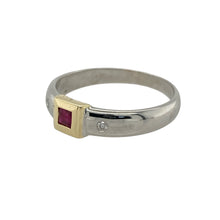 Load image into Gallery viewer, Bring refined elegance and rich colour to your collection with this pre-owned 14ct white gold diamond and ruby set ring, offering a timeless design and sophisticated sparkle—perfect for adding a touch of luxury to any look.

Design: The ring features a vibrant 2mm by 2mm centre ruby set in yellow gold, creating a striking contrast against the white gold band. The shoulders are accented with shimmering diamonds, enhancing the brilliance and adding extra elegance to the piece.

