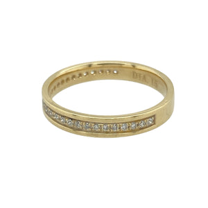 Bring refined sparkle and timeless elegance to your collection with this pre-owned 18ct yellow gold and diamond set band ring, offering a classic blend of luxurious detail and sophisticated design—perfect for everyday wear or marking special occasions.

Design: The ring features a sleek 3mm wide band set with sparkling diamonds, creating a continuous line of brilliance that adds subtle yet eye-catching shine.
