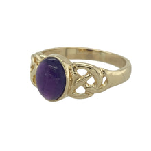 Load image into Gallery viewer, Bring rich colour and symbolic elegance to your collection with this pre-owned 9ct yellow gold and amethyst cabochon set Celtic knot ring, offering a beautiful blend of timeless tradition and vibrant charm—perfect for adding a meaningful statement to any look.

Design: The ring features an oval cabochon amethyst measuring 8mm by 6mm, framed by an intricate Celtic knot design that symbolises eternity and interconnectedness.

