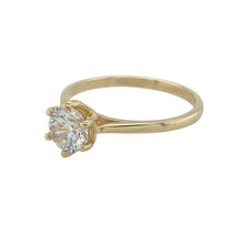 Load image into Gallery viewer, Bring classic sparkle and timeless simplicity to your collection with this pre-owned 9ct yellow gold and cubic zirconia set solitaire ring, offering a refined blend of elegant design and eye-catching brilliance—perfect for any occasion.

Design: The ring features a single round cubic zirconia stone measuring 7mm in diameter, creating a bold and radiant focal point that captures the light beautifully.


