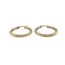 Load image into Gallery viewer, Bring timeless texture and elegant shine to your collection with these pre-owned 9ct yellow gold patterned hoop creole earrings, offering a refined blend of classic style and eye-catching detail—perfect for any occasion.

Design: Each earring features a polished hoop creole shape adorned with an intricate pattern, adding depth and visual interest while maintaining a classic silhouette.


