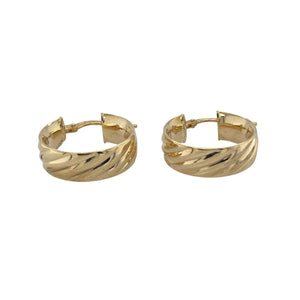 Bring eye-catching texture and timeless style to your collection with these pre-owned 9ct yellow gold patterned stripy hoop creole earrings, offering a refined blend of classic elegance and modern detail—perfect for enhancing any look.

Design: Each earring features a polished hoop creole shape adorned with a distinctive stripy pattern, adding depth and visual interest while maintaining a sleek silhouette.
