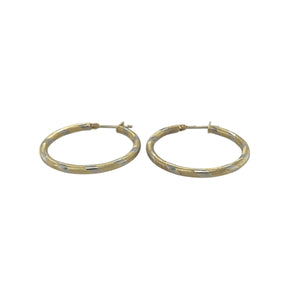 Bring modern contrast and timeless elegance to your collection with these pre-owned 9ct white and yellow gold hoop creole earrings, offering a sophisticated mix of tones and versatile style — perfect for any occasion.

Design: These stylish earrings feature a classic hoop creole shape, beautifully combining white and yellow gold for a sleek, contemporary two-tone look that stands out effortlessly.