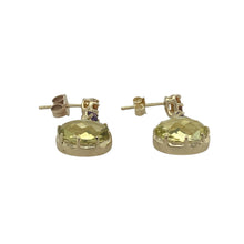 Load image into Gallery viewer, Bring vibrant colour and graceful movement to your collection with these pre-owned 9ct yellow gold peridot, citrine, and amethyst set drop earrings, offering a lively blend of gemstones and elegant design — perfect for special occasions or standout everyday wear.

Design: Each earring features a trio of gemstones in a vertical drop arrangement, ending with a 10mm by 8mm oval peridot that adds a fresh, green focal point beneath citrine and amethyst accents.

