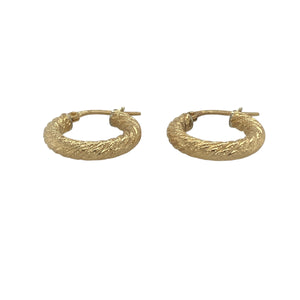 Bring elegant texture and graceful movement to your collection with these pre-owned 9ct yellow gold patterned twisted hoop creole earrings, offering timeless design and detailed charm — perfect for elevating any look.

Design: These stylish creole earrings feature a twisted hoop shape enhanced with intricate patterning, creating depth, sparkle, and a softly flowing silhouette.
Material: Made from 9-carat yellow gold