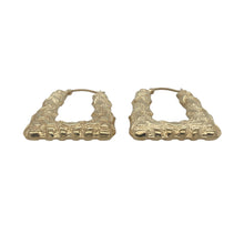 Load image into Gallery viewer, Bring playful elegance and bold style to your collection with these pre-owned 9ct yellow gold patterned handbag style creole earrings, offering a unique design and radiant detail — perfect for adding personality to any look.

Design: These standout creole earrings feature a charming handbag-inspired shape with intricate patterning, creating a fun and fashionable twist on a classic hoop.

