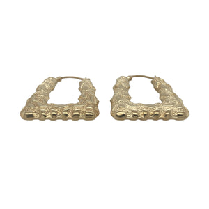 Bring playful elegance and bold style to your collection with these pre-owned 9ct yellow gold patterned handbag style creole earrings, offering a unique design and radiant detail — perfect for adding personality to any look.

Design: These standout creole earrings feature a charming handbag-inspired shape with intricate patterning, creating a fun and fashionable twist on a classic hoop.
