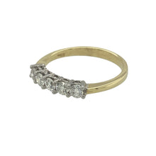 Load image into Gallery viewer, Bring graceful sparkle and timeless elegance to your collection with this pre-owned 18ct yellow gold and diamond set five stone band ring, offering classic brilliance and refined charm — perfect for special occasions or meaningful everyday wear.

Design: This elegant ring features five round-cut diamonds set across the front, with a total estimated diamond weight of approximately 0.40ct, creating a balanced and radiant display.

