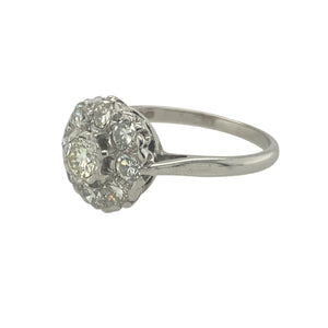 Bring vintage charm and brilliant sparkle to your collection with this pre-owned 18ct white gold and diamond set cluster ring, offering timeless elegance and refined detail — perfect for special occasions or classic everyday luxury.

Design: This vintage-style cluster ring features a central diamond of approximately 0.17ct, surrounded by a halo of additional diamonds totalling approximately 0.24ct, for a combined diamond content of around 0.41ct.
