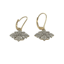 Load image into Gallery viewer, Bring graceful sparkle and floral charm to your collection with these pre-owned 9ct yellow gold and diamond set flower style drop earrings, offering delicate detail and timeless elegance — perfect for refined everyday wear or special occasions.

Design: These elegant drop earrings feature a flower-inspired design set with shimmering diamonds, creating a soft, feminine silhouette with eye-catching sparkle.

