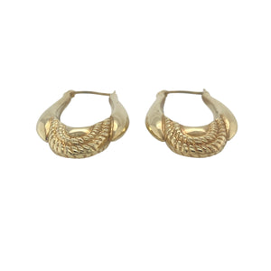 Bring elegant shape and timeless texture to your collection with these pre-owned 9ct yellow gold patterned long oval creole earrings, offering graceful design and classic detail — perfect for elevating everyday style or completing a special occasion look.

Design: These striking earrings feature an elongated oval creole shape, enhanced with intricate patterning that adds depth and visual interest to a refined silhouette.
