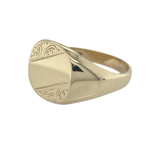 Bring bold elegance and classic detailing to your collection with this pre-owned 9ct yellow gold patterned signet ring—a substantial piece with timeless character and presence.

Design: The ring features a large 14mm high front with an engraved pattern, offering a distinguished and traditional look with refined detail.
Material: Made from 9-carat yellow gold, the polished finish enhances the rich tone and depth of the engraved design, giving the piece a confident, stately appearance.
