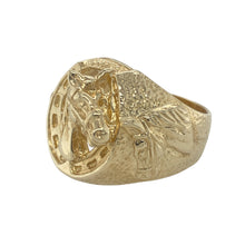 Load image into Gallery viewer, Bring bold character and equestrian spirit to your collection with this pre-owned 9ct yellow gold horse head and horseshoe ring—a striking design with powerful symbolism and substantial presence.

Design: The ring features a large 24mm high front showcasing a raised horse head within a horseshoe, complemented by detailed horse head motifs on each shoulder for a dramatic, sculptural effect.
Material: Made from 9-carat yellow gold, the highly polished finish enhances the depth
