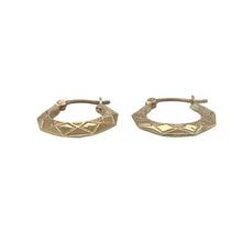 Load image into Gallery viewer, Bring subtle texture and classic shine to your collection with these pre-owned 9ct yellow gold patterned creole earrings—an elegant design with everyday versatility and timeless appeal.

Design: The earrings feature a traditional creole shape with delicate engraved patterns, adding a refined touch of texture to their curved silhouette.
Material: Made from 9-carat yellow gold, the polished finish enhances the intricate detailing and gives a soft, radiant glow.

