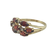 Load image into Gallery viewer, Bring rich colour and classic sparkle to your collection with this pre-owned 9ct yellow gold diamond and garnet set cluster ring—a timeless design with warm tones and elegant detail.

Design: The ring features a striking cluster of marquise-cut garnet stones, each measuring 6mm by 4mm, arranged in a fan-like formation with sparkling diamonds set between for added brilliance and contrast.

