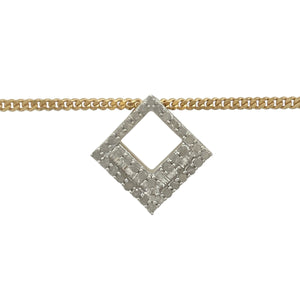 Bring structured sparkle and elegant geometry to your collection with this pre-owned 9ct yellow gold and diamond set square cluster pendant necklace—a refined design with a bold edge and timeless brilliance.

Design: The pendant measures 1.7cm in length and features a square-shaped cluster of diamonds with cut-out corners, creating a modern, softened silhouette while maximising brilliance and symmetry.
Material: Made from 9-carat yellow gold, the polished setting beautifully frames the cluster of diamonds