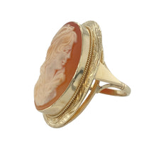 Load image into Gallery viewer, Bring antique character and statement elegance to your jewellery collection with this pre-owned 9ct yellow gold and large cameo ring—featuring intricate detail and timeless vintage appeal.

Design: A 25mm by 19mm oval cameo is the centrepiece, framed in an engraved patterned setting that enhances its classical charm and bold presence.
Material: Made from 9-carat yellow gold, the richly detailed frame adds depth and texture, perfectly complementing the soft tones of the cameo.

