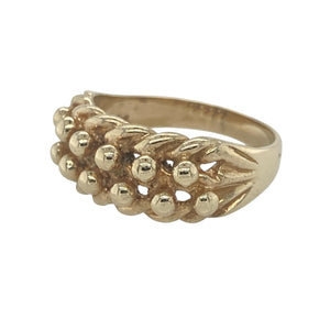Bring heritage style and bold texture to your jewellery collection with this pre-owned 9ct yellow gold double row keeper ring—featuring a classic woven design with strong visual impact.

Design: The double row keeper style showcases an 8mm high front with interlocking gold loops, creating a traditional and tactile finish.
Material: Made from 9-carat yellow gold, the rich tone and polished surface enhance the depth and detail of the woven design.
