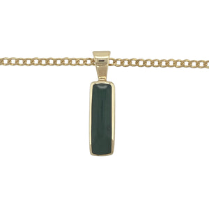 Bring rich colour and bold elegance to your jewellery collection with this pre-owned 9ct yellow gold and dark green jade oblong pendant—paired with an 18" curb chain for a classic, statement look.

Design: A 19mm by 5mm oblong dark green jade stone forms the centrepiece, set vertically in a sleek gold mount. The full pendant length is 2.8cm including the bail.
Material: Made from 9-carat yellow gold, the setting and sturdy curb chain offer a warm contrast to the deep green jade