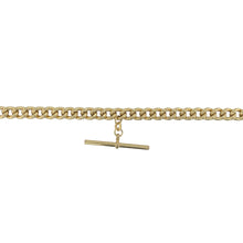 Load image into Gallery viewer, Make a bold statement with this pre-owned 9ct yellow gold semi hollow curb link T-bar chain—ideal for adding standout style to any look.

Design: This 18-inch round curb link chain features wide 7mm semi hollow links and a classic T-bar detail, combining traditional design with a modern edge.
Material: Made from 9-carat yellow gold, the chain offers a rich golden hue with a smooth polished finish, striking a balance between substance and wearability.

