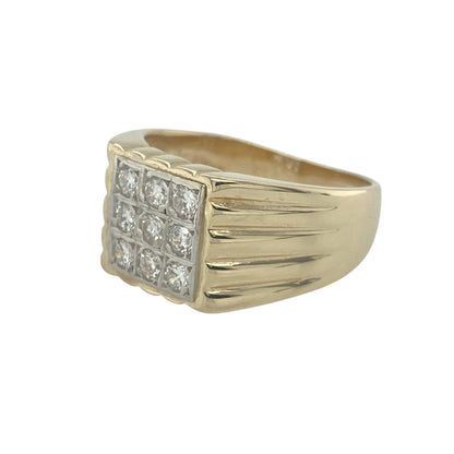 Combine classic form with subtle brilliance in this pre-owned 9ct yellow gold signet ring, elevated by a bold diamond-set design.

Design: The front of the ring measures 10mm high and features a square-shaped face set with nine round diamonds, arranged in a grid for a clean, structured look.
Material: Made from 9-carat yellow gold, the polished finish provides a rich backdrop that enhances the sparkle of the diamond layout.
