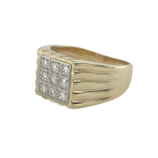 Combine classic form with subtle brilliance in this pre-owned 9ct yellow gold signet ring, elevated by a bold diamond-set design.

Design: The front of the ring measures 10mm high and features a square-shaped face set with nine round diamonds, arranged in a grid for a clean, structured look.
Material: Made from 9-carat yellow gold, the polished finish provides a rich backdrop that enhances the sparkle of the diamond layout.
