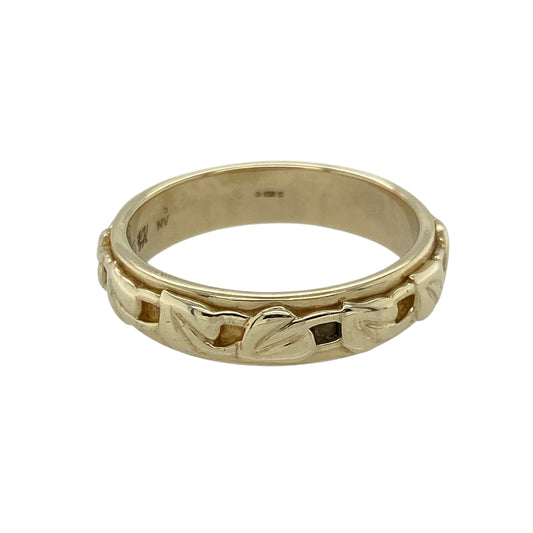 Celebrate connection, heritage, and love with this pre-owned 9ct yellow gold Clogau Tree of Life band ring—rich in symbolism and timeless in design.

Design: The 5mm wide band features Clogau’s iconic Tree of Life motif in flowing detail, representing growth, strength, and the continuity of life.
Material: Made from 9-carat yellow gold with rare Welsh gold included, this piece reflects Clogau’s commitment to craftsmanship and heritage.
