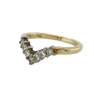 Add graceful sparkle and timeless charm to your collection with this pre-owned 18ct yellow gold diamond set wishbone ring—elegant, symbolic, and beautifully refined.

Design: The classic wishbone shape curves gently across the finger, adorned with a fine line of diamonds that add subtle brilliance and sophistication.
Material: Made from 18-carat yellow gold, the polished finish enhances the rich tone of the band and the sparkle of the diamonds.
